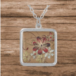 Roter Swirbelplatz Versilberte Kette<br><div class="desc">Mit dieser silberfarbenen quadratischen Halskette mit auffallender goldfarbener und roter Swirl-Optik machen Sie eine kühle Aussage. Künstlerisch,  modern und voller Flair - perfekt zum Ankleiden. Eine großartige Geschenkidee für sie oder eine hervorragende Ergänzung zu Ihrer eigenen Schmuckkollektion.</div>