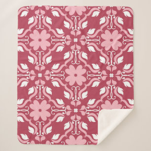Roter und beige blumengeschmückter Hintergrund. Fa Sherpadecke
