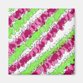 Roter und grüner Spritzer erschüttert Magnet