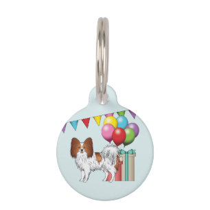 Roter und weißer Papillon Hund farbenfroh zum Gebu Haustiermarke
