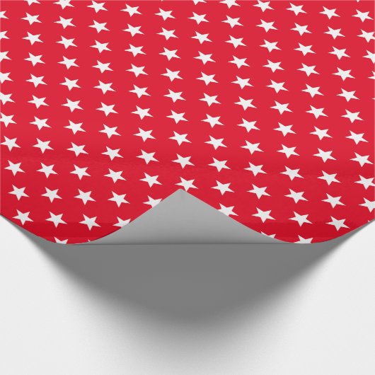 Roter und weißer Weihnachtsstern drucken glänzend Geschenkpapier (Ecke)