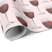 Roter Wein in Rosa Geschenkpapier (Rolleneckpunkt)
