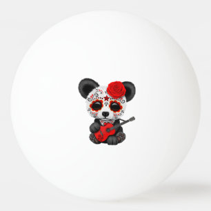Roter Zuckerschädel-Panda, der Gitarre spielt Tischtennisball