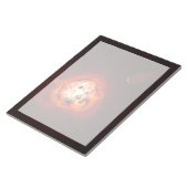 Roter Zwergstern, der von einem hypothetischen Exo Notizblock (angewinkelt)