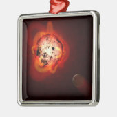 Roter Zwergstern, der von einem hypothetischen Exo Ornament Aus Metall (Links)