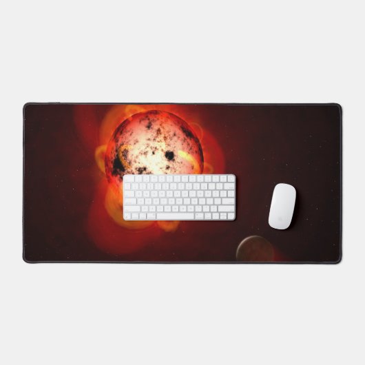 Roter Zwergstern, der von einem hypothetischen Exo Schreibtischunterlage (Tastatur & Maus)