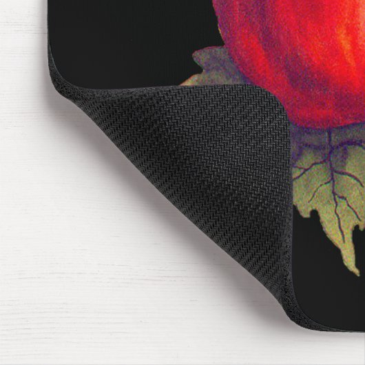 Rotes Apple auf Schwarzem Mousepad (Ecke)