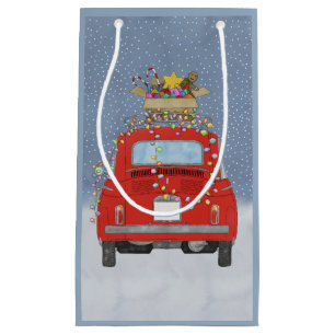 Rotes Auto mit Weihnachtsgeschenken Kleine Geschen Geschenktüte