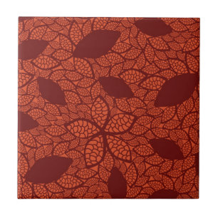 rotes Blätter-Muster auf Orange Fliese