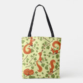 Rotes Eichhörnchen in Haselzweigen. Tasche (Rückseite)
