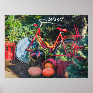 Rotes Fahrrad mit Körben und Kürbis Poster