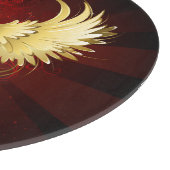 Rotes Herz mit goldenen Flügeln Schneidebrett (Ecke)