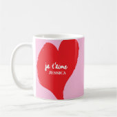Rotes Herz mit je t’aime-Text auf rosa Hintergrund Kaffeetasse (Links)