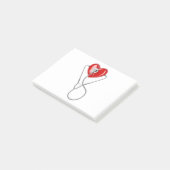 Rotes Herz und ein Stethoskop Post-it Klebezettel (angewinkelt)