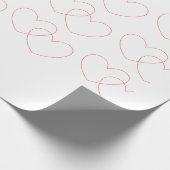 Rotes ineinander greifenherz-Packpapier Geschenkpapier (Ecke)