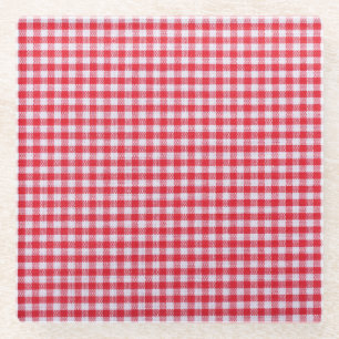 Rotes kariertes Tischdecken-Nahaufnahme. Glasuntersetzer