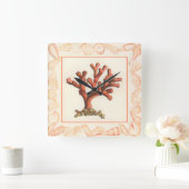 Rotes Korallenriff mit Conch-Muschel-Grenze Quadratische Wanduhr (Zuhause)