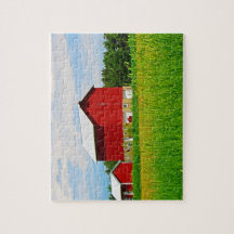 Rotes Landhaus und Weide