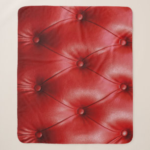 Rotes Leder: Eleganz des Polsterungsmusters. Sherpadecke