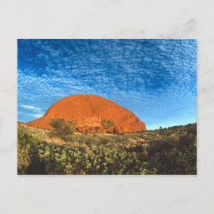 Rotes Leuchten des berühmten Ayers Rock im Outback Postkarte