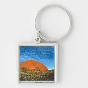 Rotes Leuchten des berühmten Ayers Rock im Outback Schlüsselanhänger