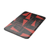 Rotes, modernes, dynamisches, trendy geometrisches badematte (Schrägansicht)