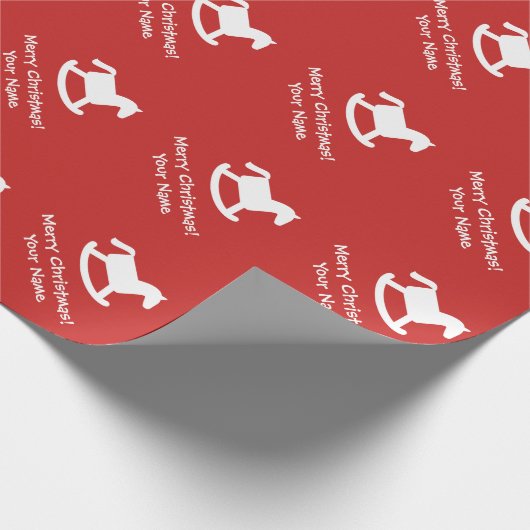 Rotes Packpapier das Schaukelpferd des Kindes (Ecke)