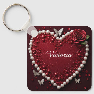 Rotes Perlenherz mit Rosen zur Valentinsdekoration Schlüsselanhänger