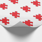 ROTES PUZZLE-STÜCK GESCHENKPAPIER (Ecke)
