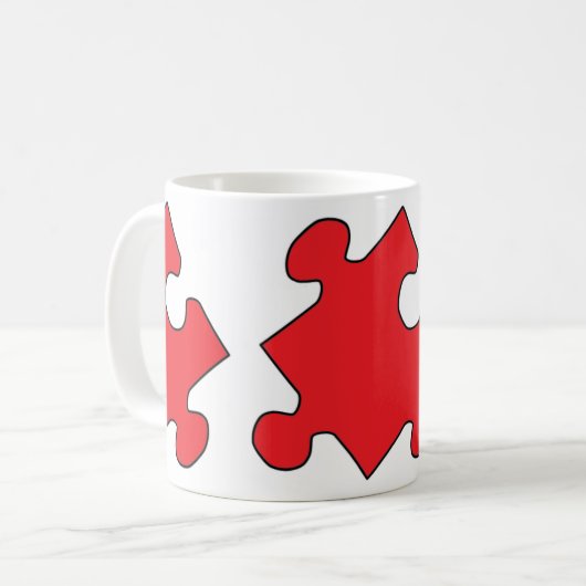 ROTES PUZZLE-STÜCK KAFFEETASSE (Vorderseite Links)