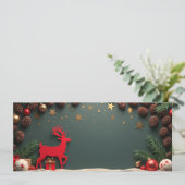 Rotes Renne Papier auf grünem Hintergrund (Stehend Vorderseite)