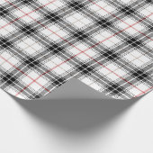 Rotes Schwarz-weißes schottisches Tartan-Kariertes Geschenkpapier (Ecke)