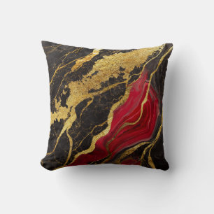 Rotes schwarzes Marmormuster mit Gold Kissen