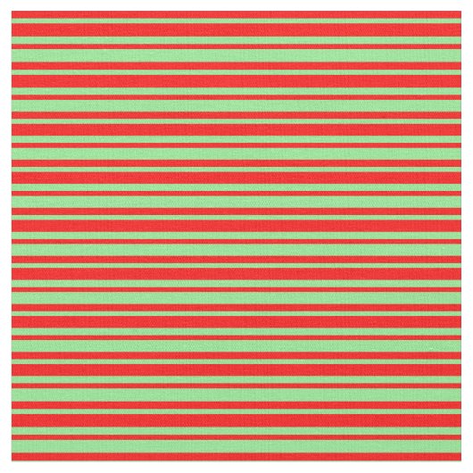 Rotes und hellgrün gefärbtes Muster Stoff (Nahaufnahme)