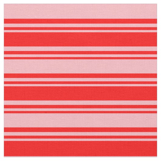 Rotes und hellrosa farbiges Muster der Streifen Stoff (Nahaufnahme)