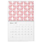 Rotes und rosafarbenes Packpapier mit wiederholend Kalender (Feb 2027)