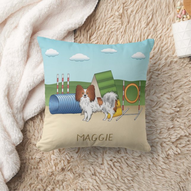 Rotes und weißes Papillon mit Agility Kissen (Decke)