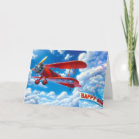 Rotes Vintages Flugzeug mit Geburtstagsbanner