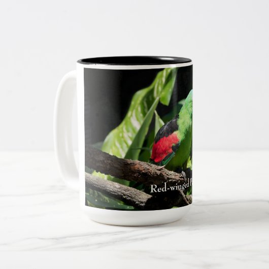 Rotflügelpapagei auf Baumlippe Zweifarbige Tasse (Vorderseite Links)