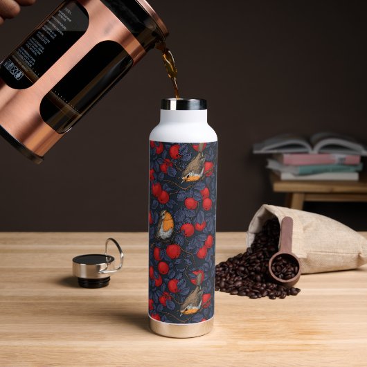Rotkehlchen im Apfelbaum/ blau und rot Trinkflasche (Kaffee)