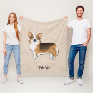 Rotköpfiger dreifarbiger Pembroke Welsh Corgi und Fleecedecke