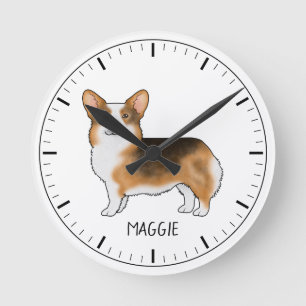 Rotköpfiger dreifarbiger Pembroke Welsh Corgi und Runde Wanduhr