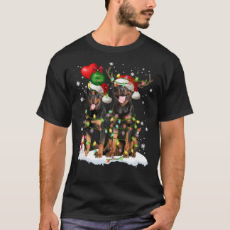 Rottweiler Couple Weihnachtsmannmütze Light Rentie T-Shirt