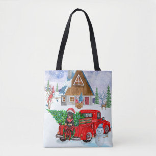 Rottweiler-Hund im Weihnachtslieferwagen Schnee Tasche