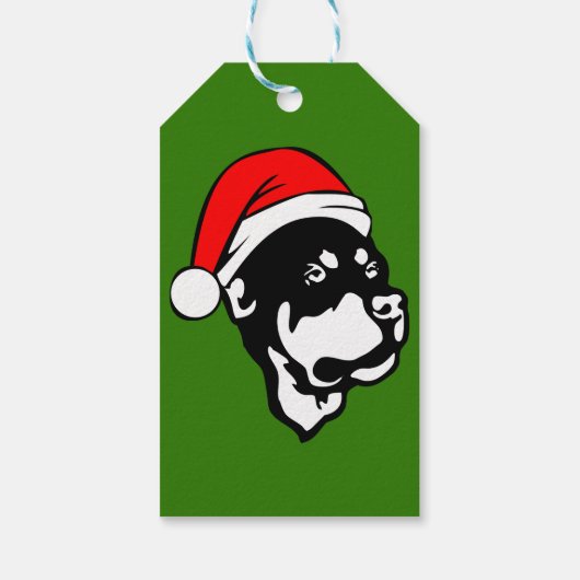 Rottweiler Hund trägt eine Red Christmas Weihnacht Geschenkanhänger (Rückseite)