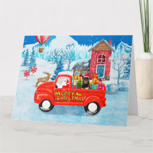 Rottweiler-Hund-Weihnachtslieferwagen-Schnee Karte