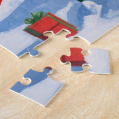 Rottweiler läuft im Schnee mit Weihnachtshut Puzzle (Seite)