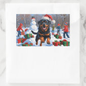 Rottweiler läuft im Schnee mit Weihnachtshut Rechteckiger Aufkleber (Tasche)