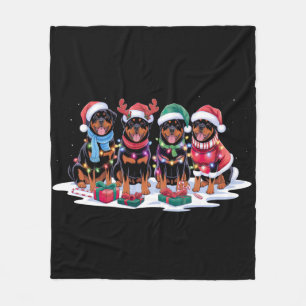 Rottweiler-Weihnachtsmannmütze gegen elf Weihnacht Fleecedecke