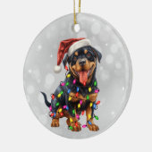 Rottweiler Welpe in Weihnachtsbeleuchtung gepackt Keramik Ornament (Links)